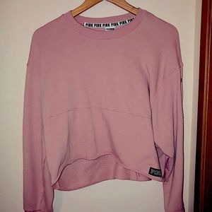 VS PINK cropped sweater with snap sleeves.
